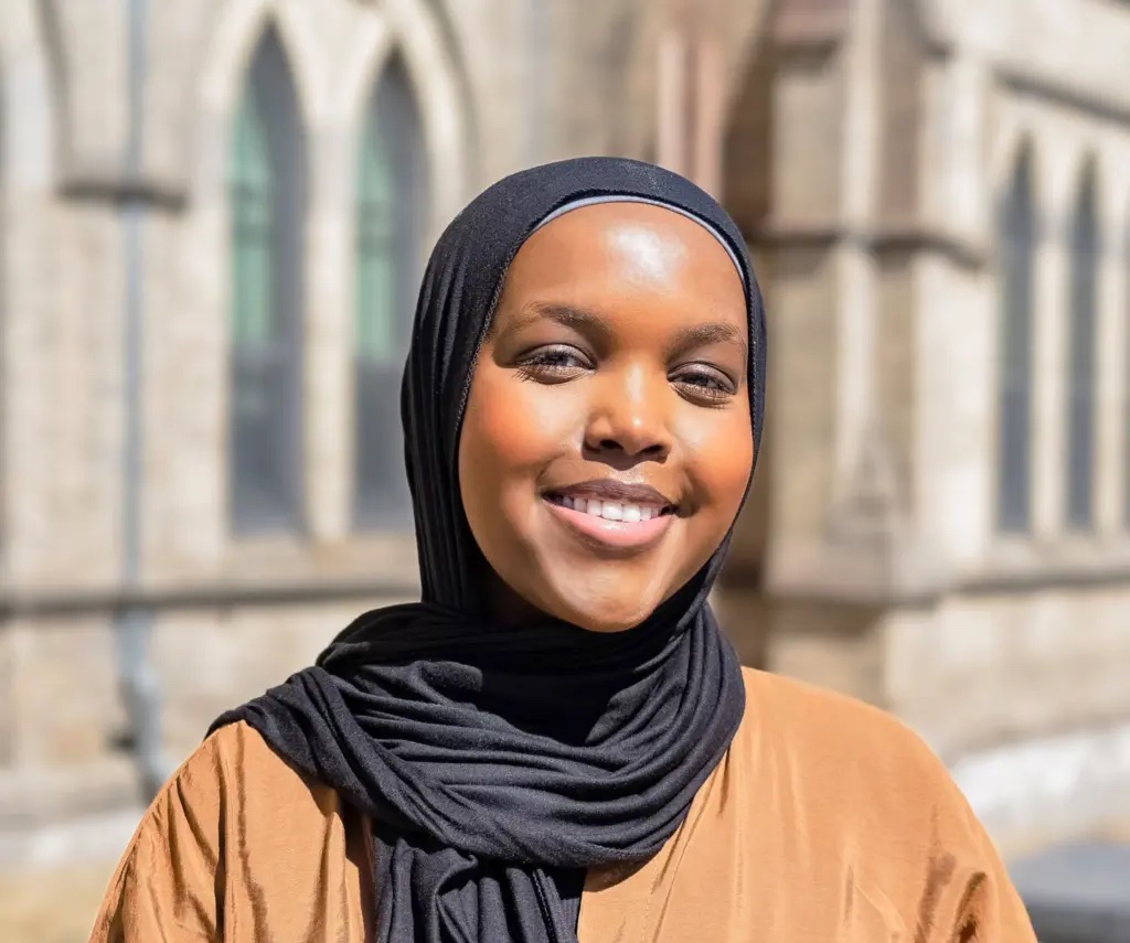 portrait of zanira ali outside of the daniels building