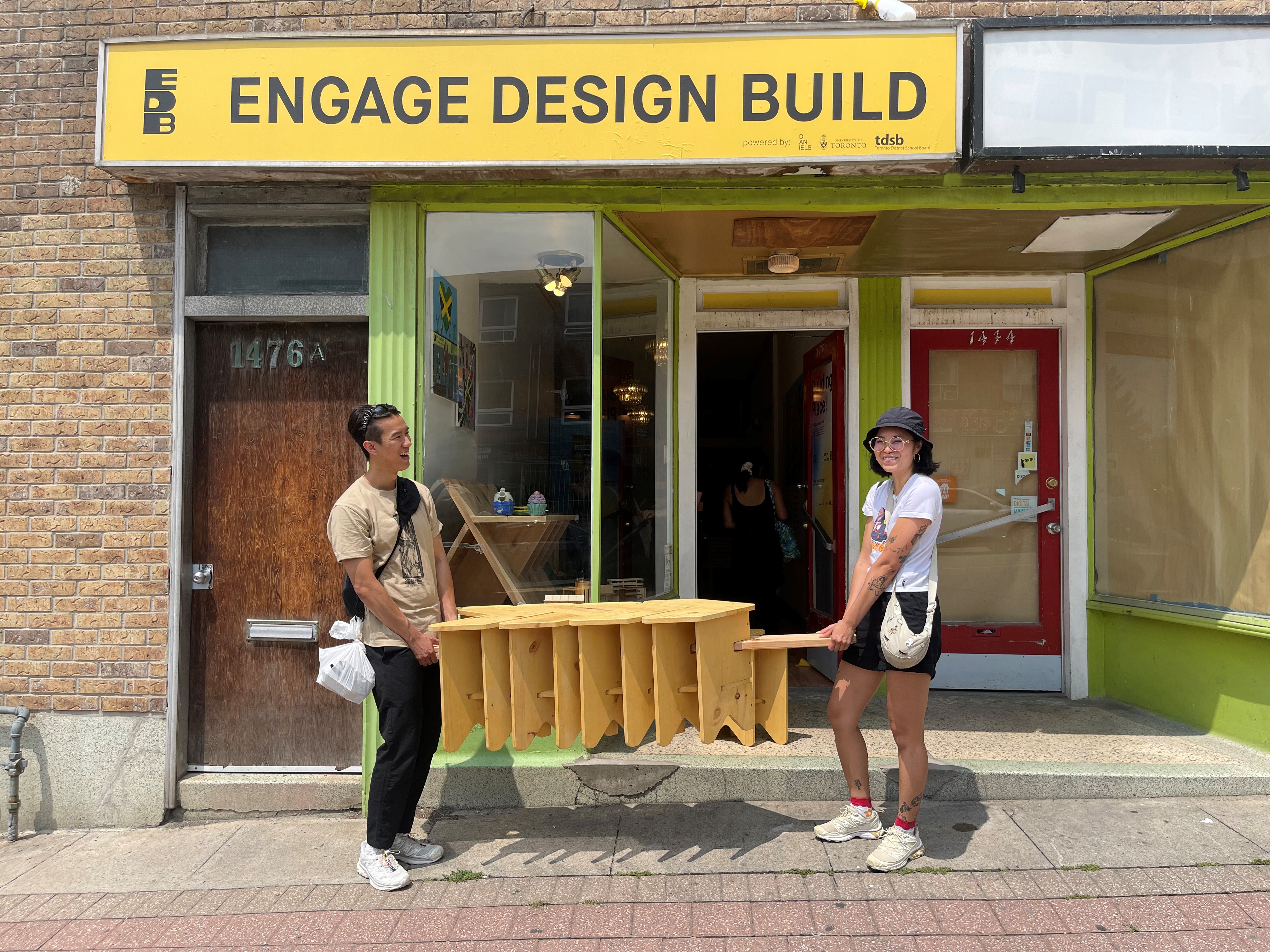 A display item being carried into the Building Place! exhibition