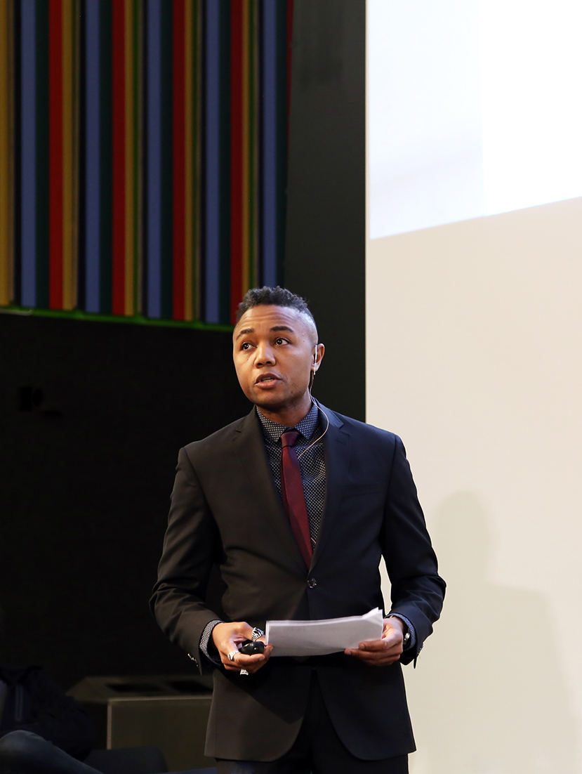 Person at Symposium Event